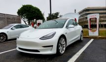 Tesla Model 3 charges in Tallahassee, trunk open.