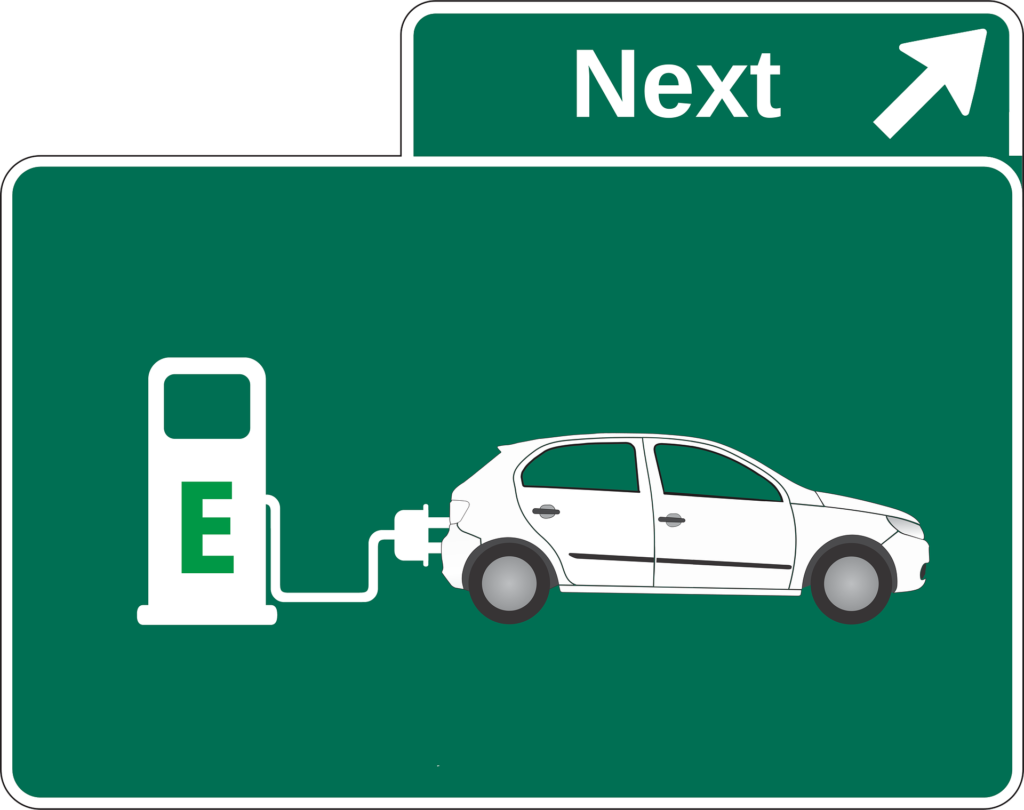 Green sign indicating electric vehicle charging stations